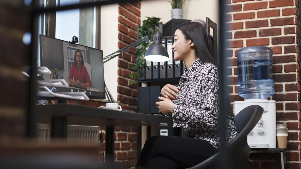 Remote worker on Zoom call.